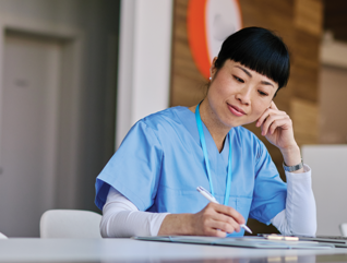nurse studying on computer