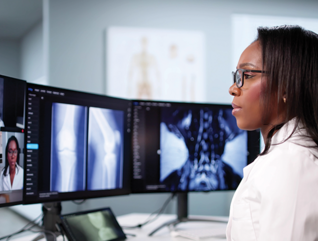 doctor on conference call with care team