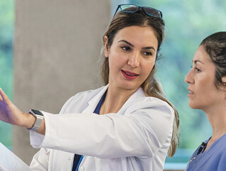 nurse and physician discuss data