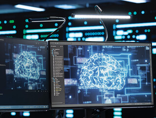 women on computer with digital brain