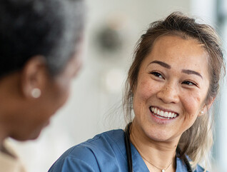nurse visits with patient