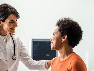 doctor reassures patient