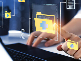 doctor signing into computer folders