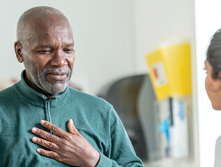 patient talks to doctor during appointment