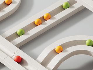 colorful marbles move through white paths