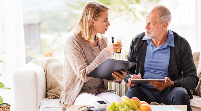 Doctor and patient at home
