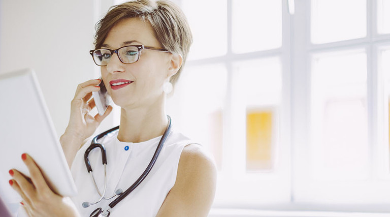 Female doctor with iPad