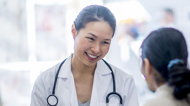 doctor talking to patient