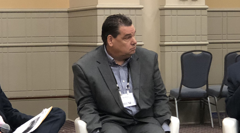 From left: Lifespace Communities VP of IT John Couture and Covenant Living Communities and Services CIO Bill Rabe listen as Acts Retirement-Life Communities Senior VP and CIO Peter Kress talks about the next generation of senior care CIOs.