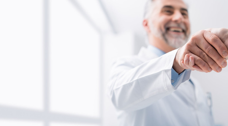 doctor shaking patient's hand
