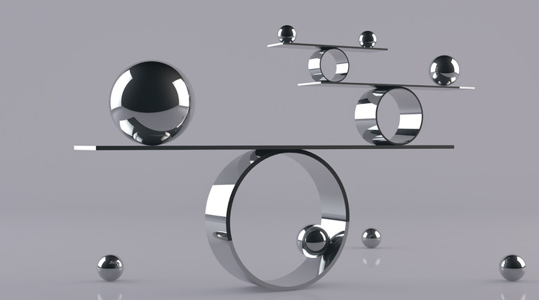 Reflective balls balancing on metal shelves. Balancing concept