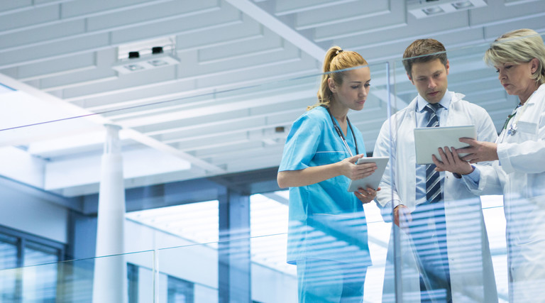 Clinicians discuss patient data