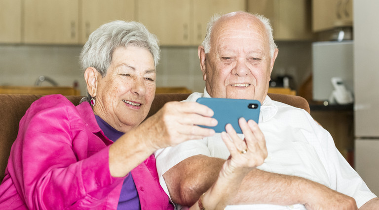 Seniors using smartphone