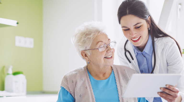 Doctor shows patient health record