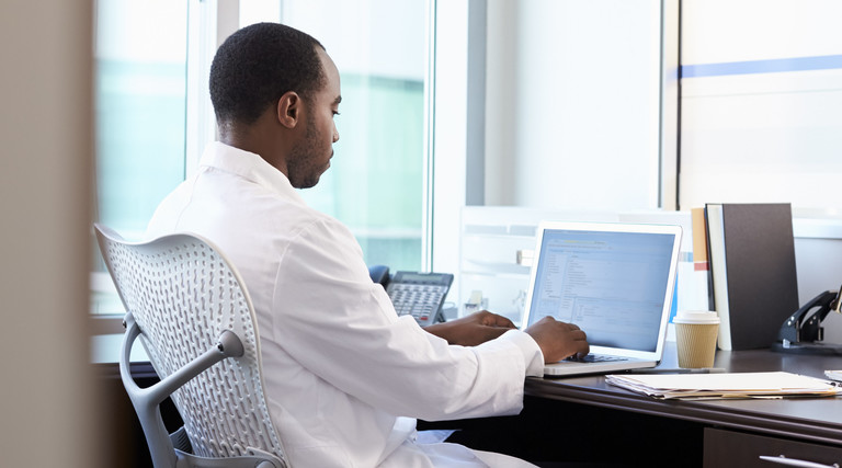Doctor sitting at desk