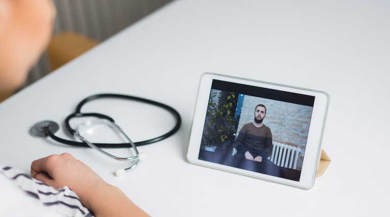 Doctor talks with patient