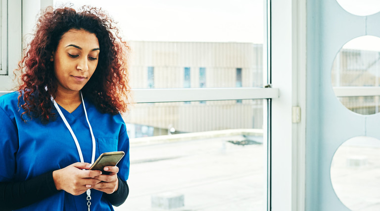 Nurse with smartphone