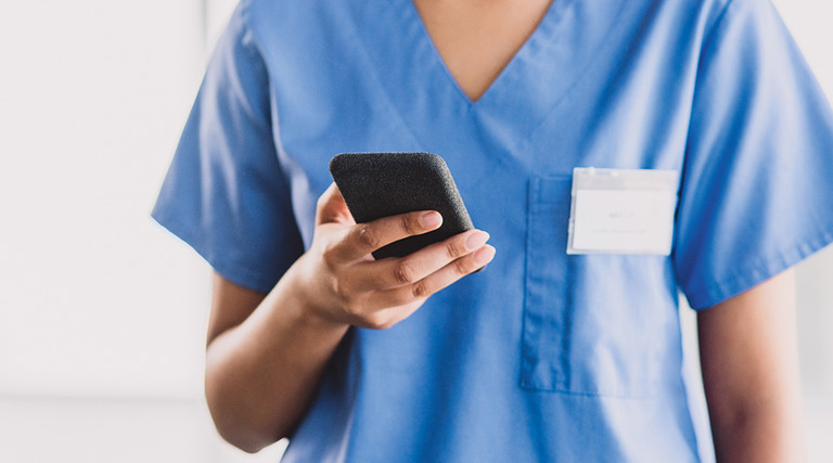 nurse on smartphone