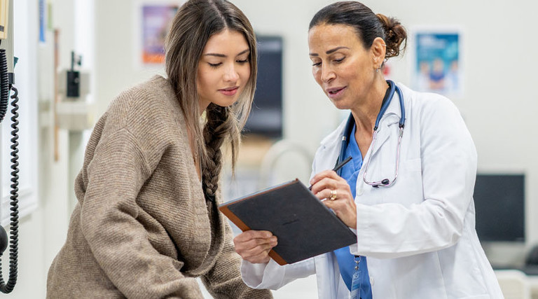 Patient speaking with doctor