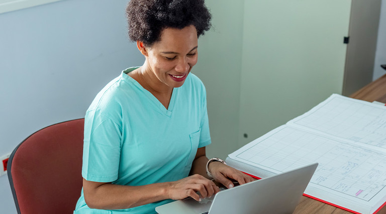 Doctor using computer in hospital