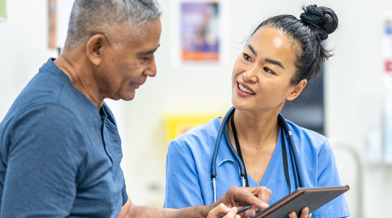 A doctor and patient talking together