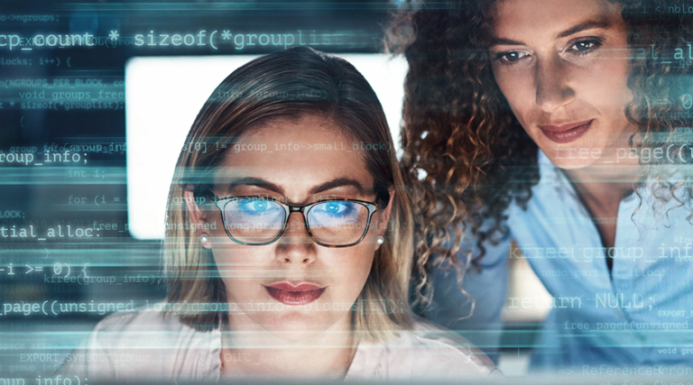 IT staff look at malicious code