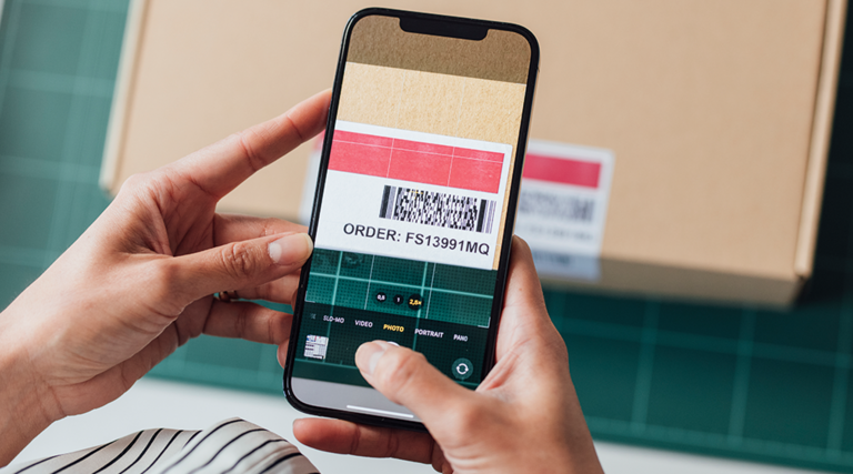 person scans barcode with phone