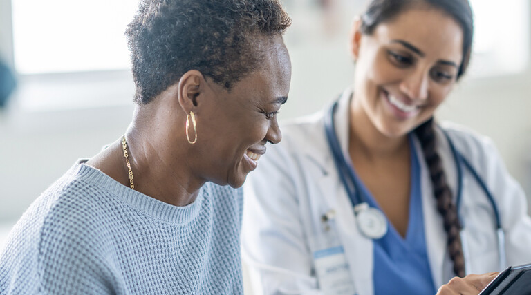 Doctor speaking with patient