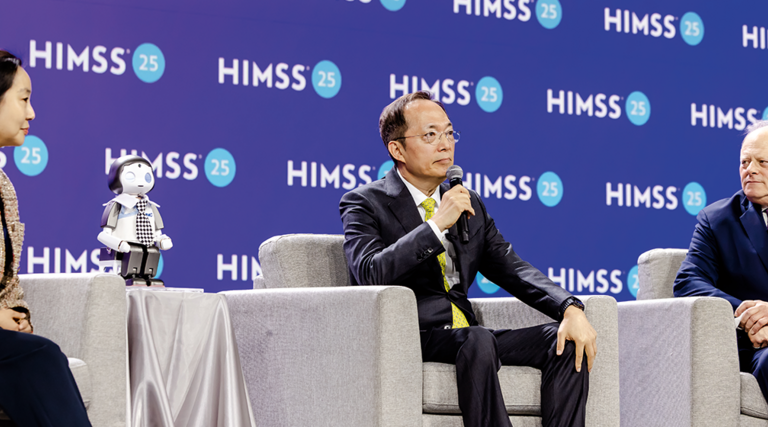 panelists on stage at HIMSS25