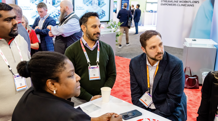 HIMSS25 attendees network on exhibit floor