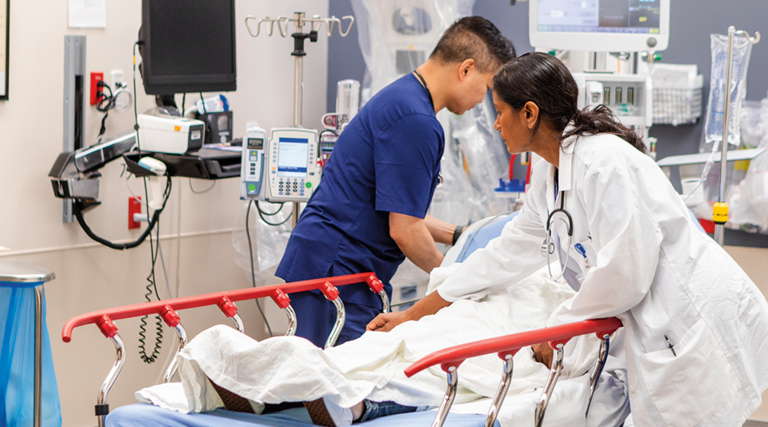 doctors take care of patient in the ER
