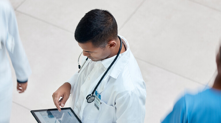 Doctor reviewing health record
