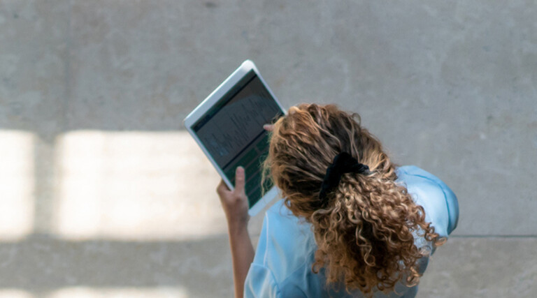 Nurse using tablet in hospital