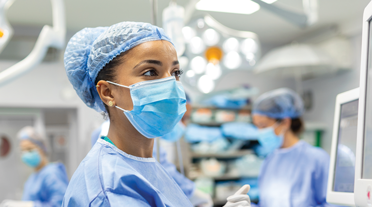 nurse check monitor in the OR