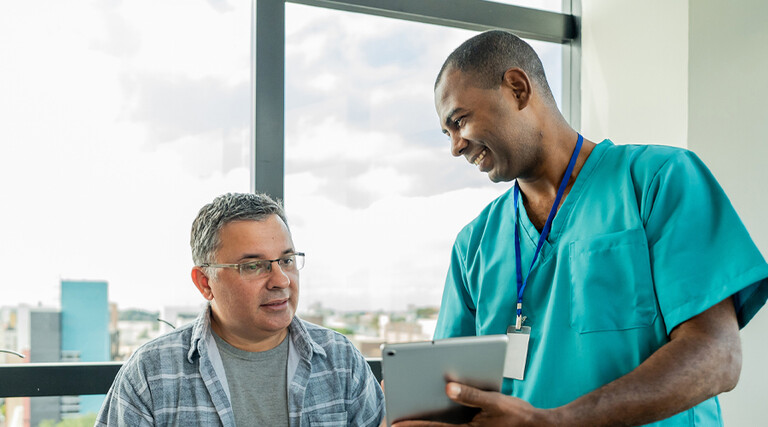 Doctor speaking with patient