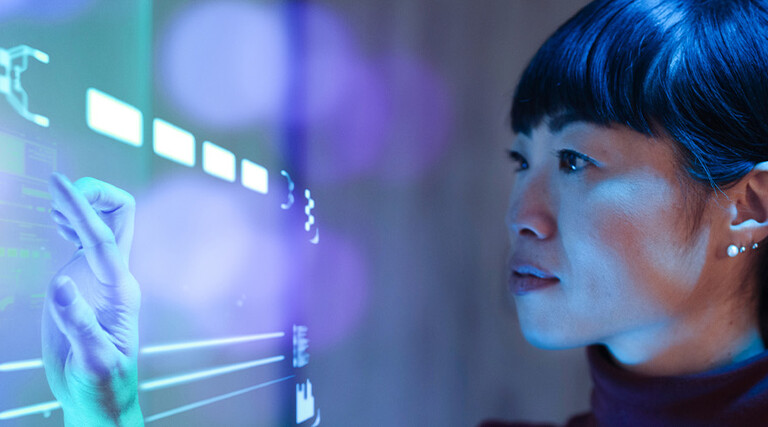Person working with a futuristic computer
