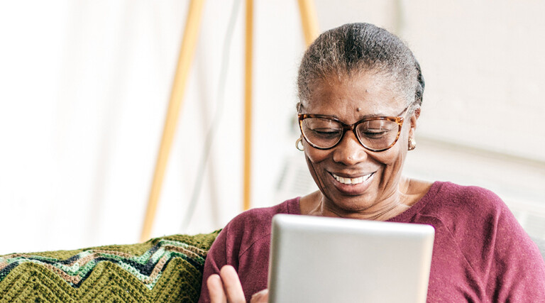 Older person using tablet