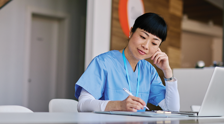 nurse studying on computer