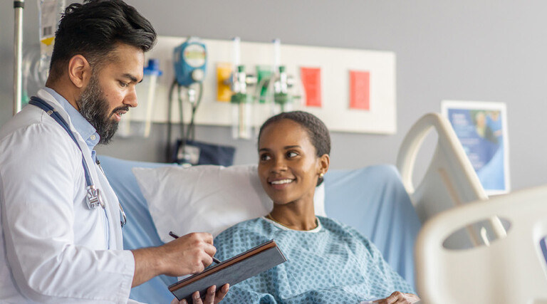 Doctor speaking with patient