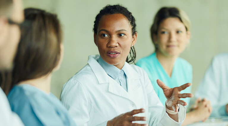 Doctors collaborating in meeting