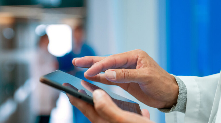 Doctor using tablet