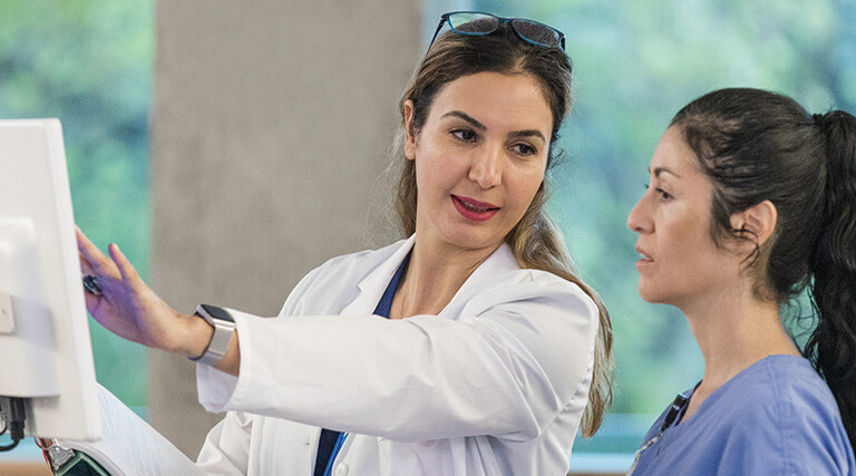 nurse and physician discuss data