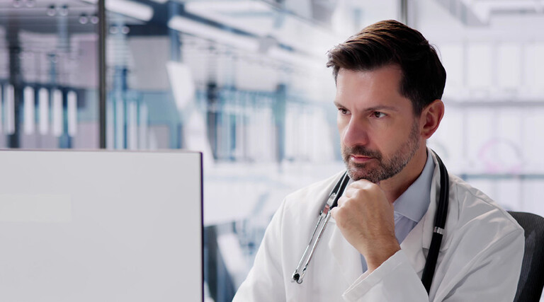 Doctor using computer