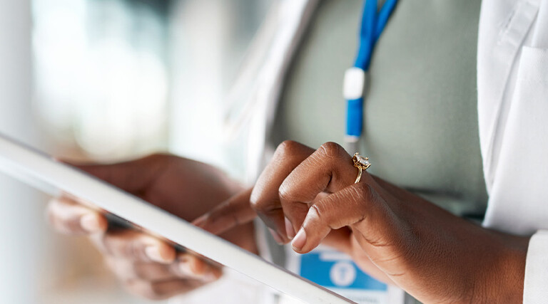 Doctor using tablet