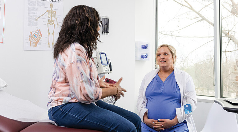 doctor focuses on patient during appointment