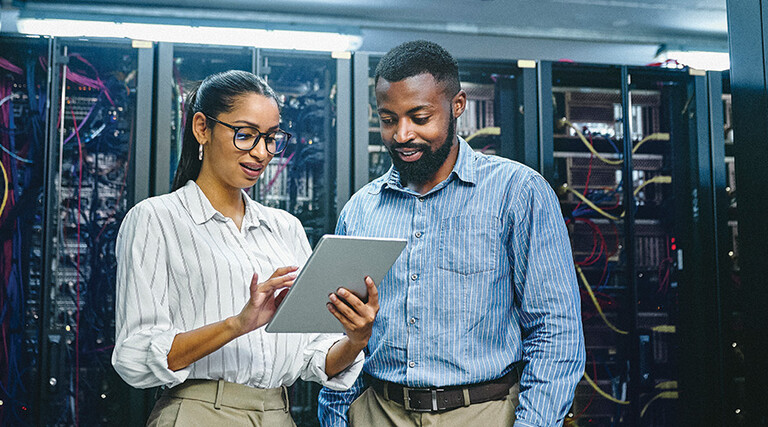 IT specialists collaborate in data center