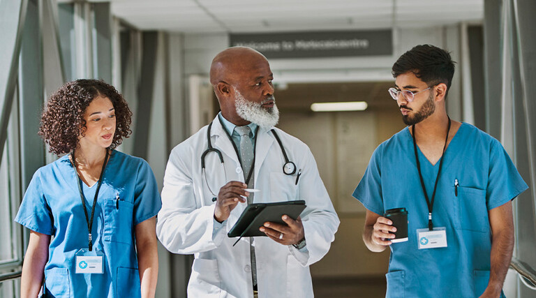 Doctor and nurses talking