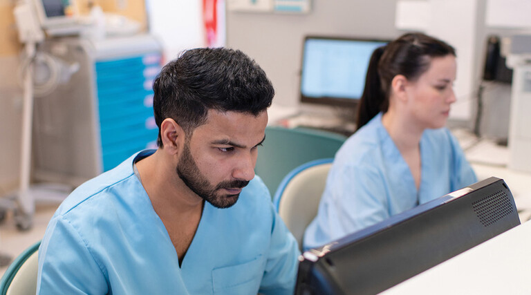 Clinicians at the nurse station