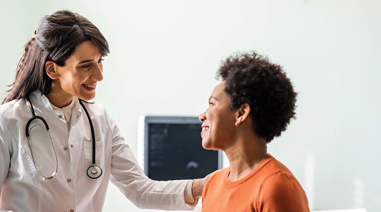 doctor reassures patient