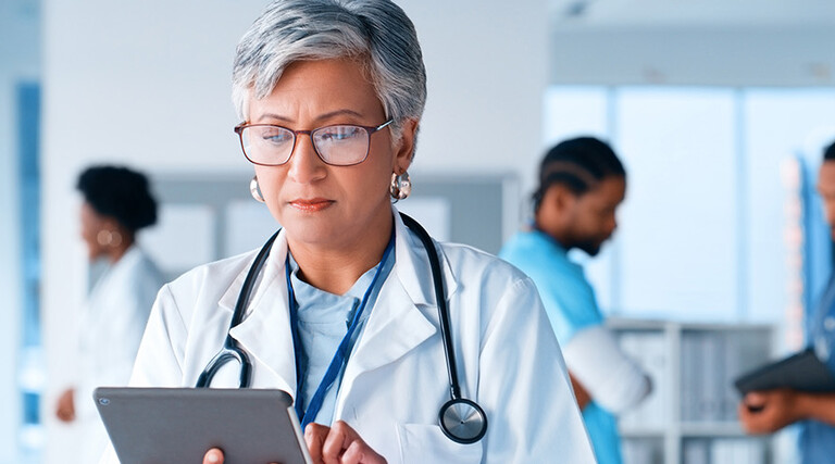 Doctor using tablet